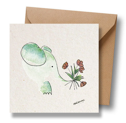 Olifant draagt bloemen